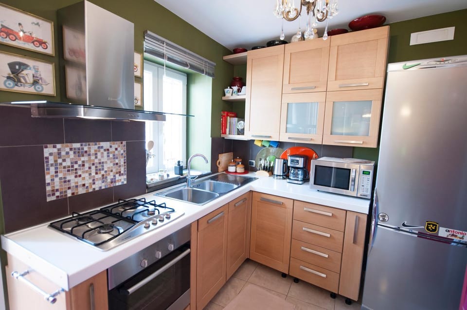 Kitchen or kitchenette, oven, stove, toaster