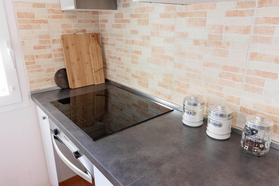 Kitchen or kitchenette, stove