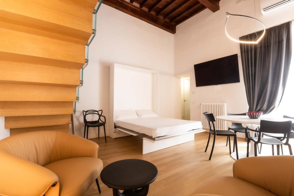 Bed, TV and multimedia, Living room, Seating area, Dining area