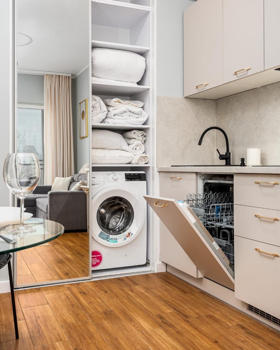 Kitchen or kitchenette, dishwasher, stove, washing machine