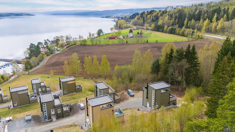 Property building, Nearby landmark, Spring, Day, Neighbourhood, Natural landscape, Bird's eye view, Lake view