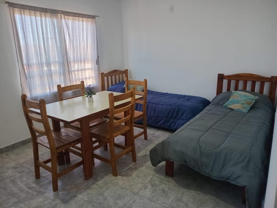 Bed, Living room, Seating area, Dining area