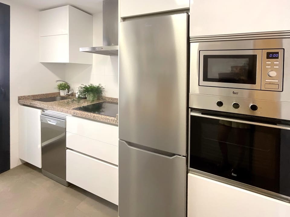 Kitchen or kitchenette, oven, stove