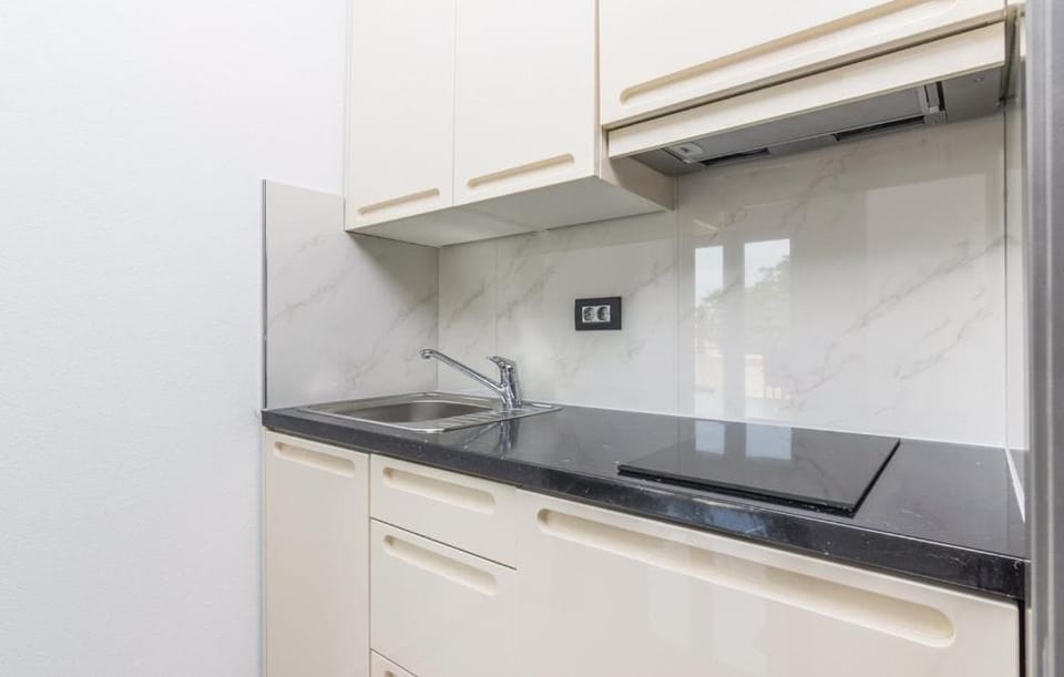 Kitchen or kitchenette, stove