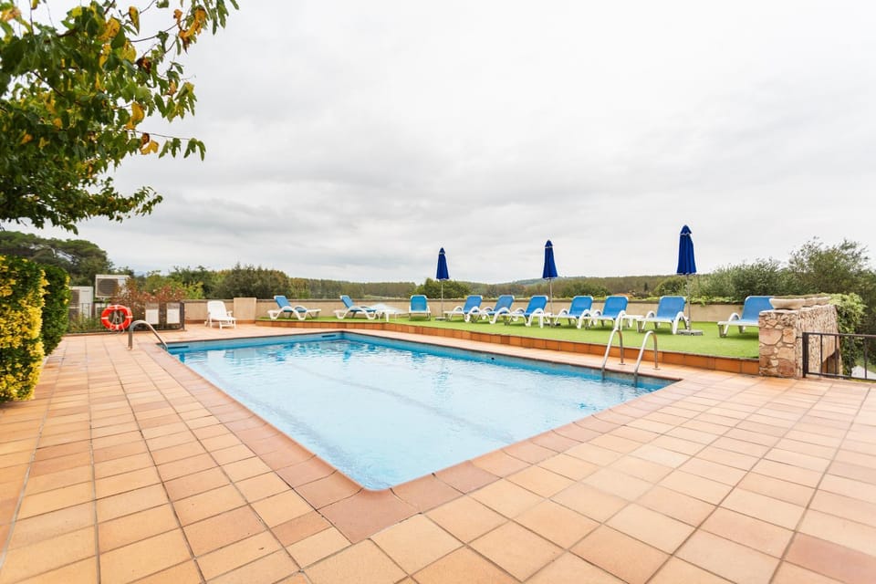 Property building, Living room, Swimming pool