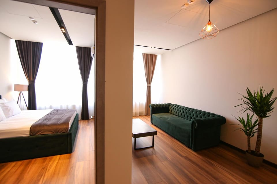 Bed, Living room, Photo of the whole room, Seating area, Bedroom