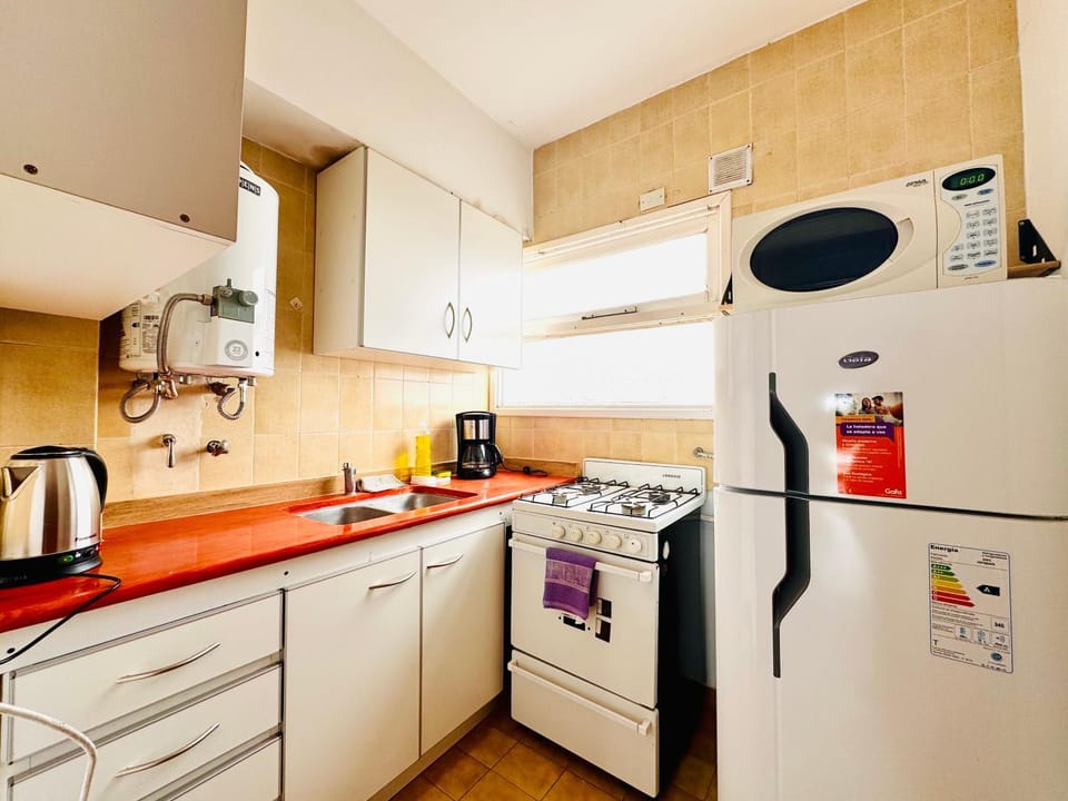 Kitchen or kitchenette, oven