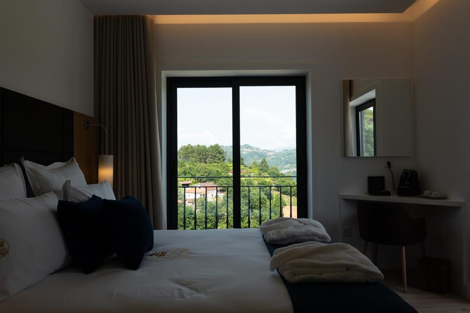 Bed, Natural landscape, Coffee/tea facilities, View (from property/room), Photo of the whole room, Bedroom, wardrobe