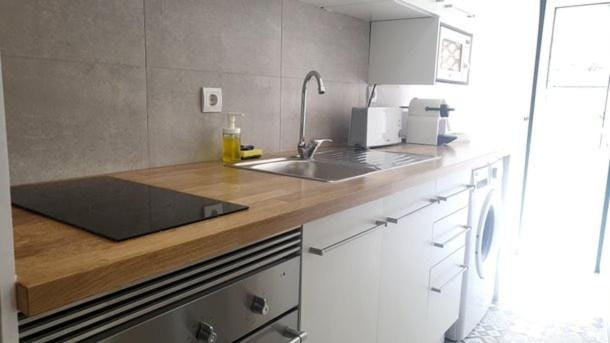 Kitchen or kitchenette, stove