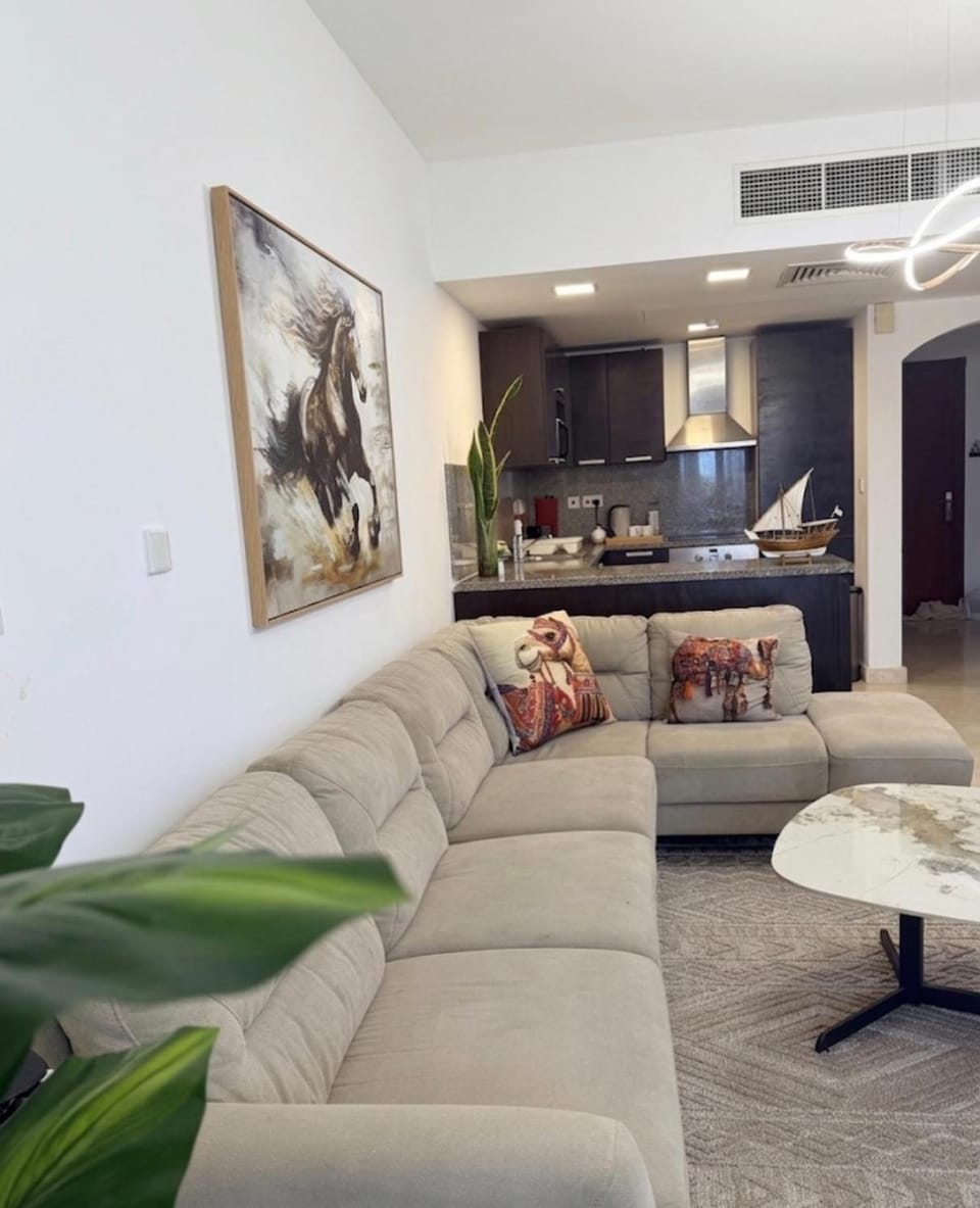 TV and multimedia, Kitchen or kitchenette, Living room, Seating area, fireplace, air conditioner