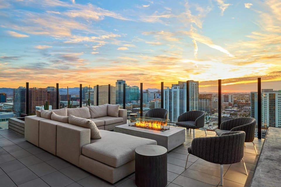 View (from property/room), Balcony/Terrace, Seating area, Sunrise, Sunset
