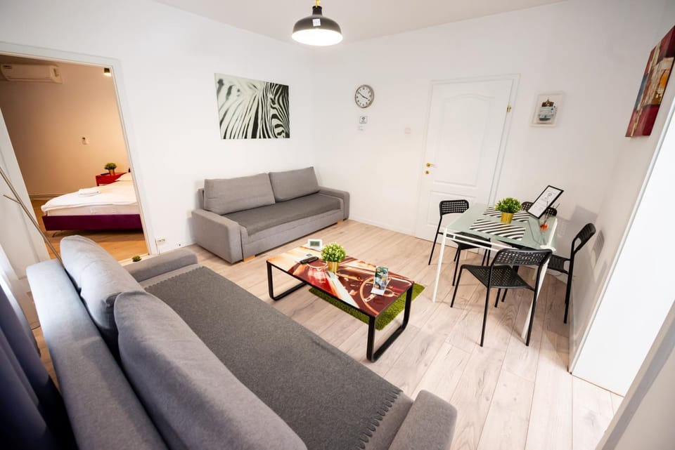 Bed, Living room, Seating area, Bedroom