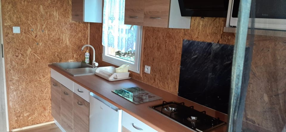 Kitchen or kitchenette, stove