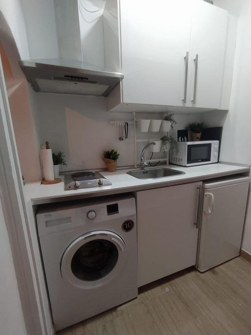 Kitchen or kitchenette, washing machine
