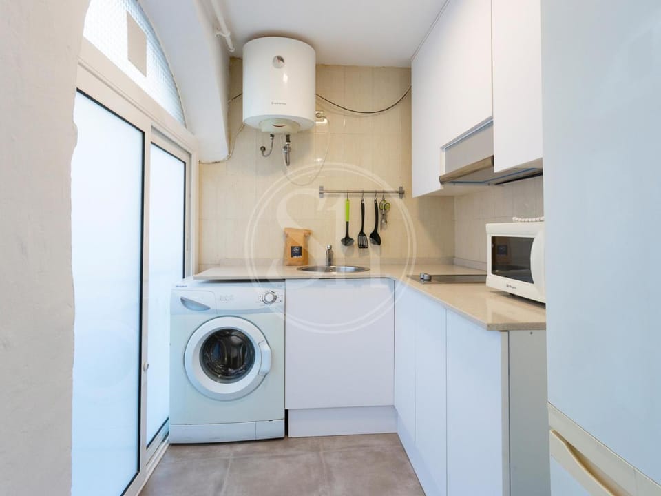 Kitchen or kitchenette, washing machine
