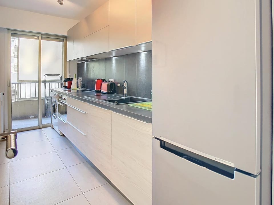 Kitchen or kitchenette, stove, toaster