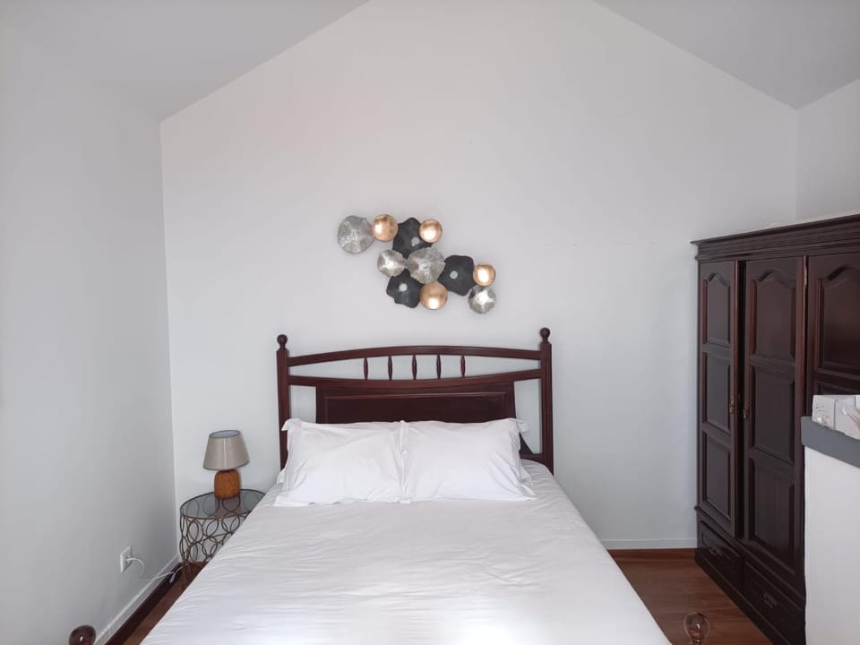 Bed, wardrobe