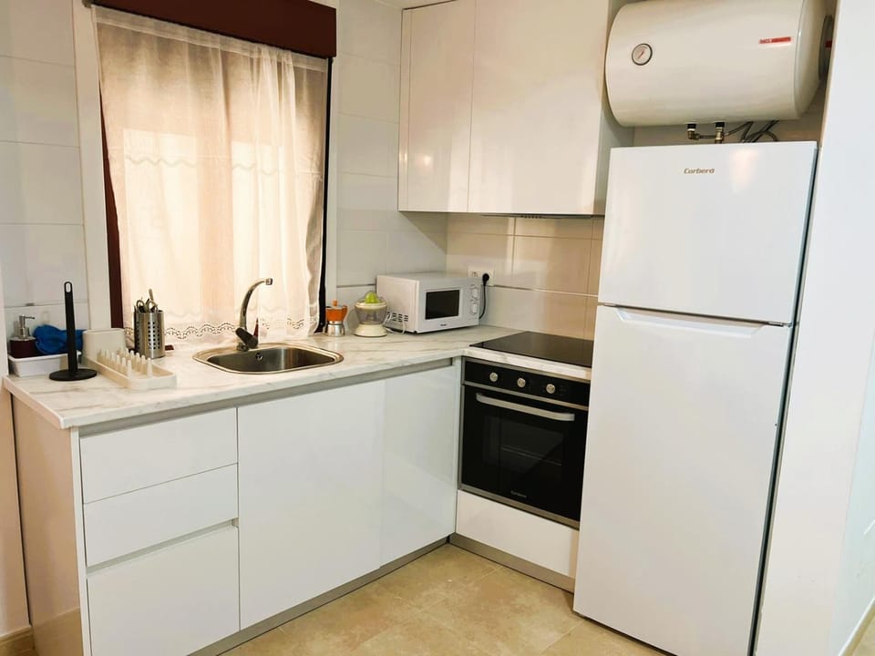 Kitchen or kitchenette, oven, stove