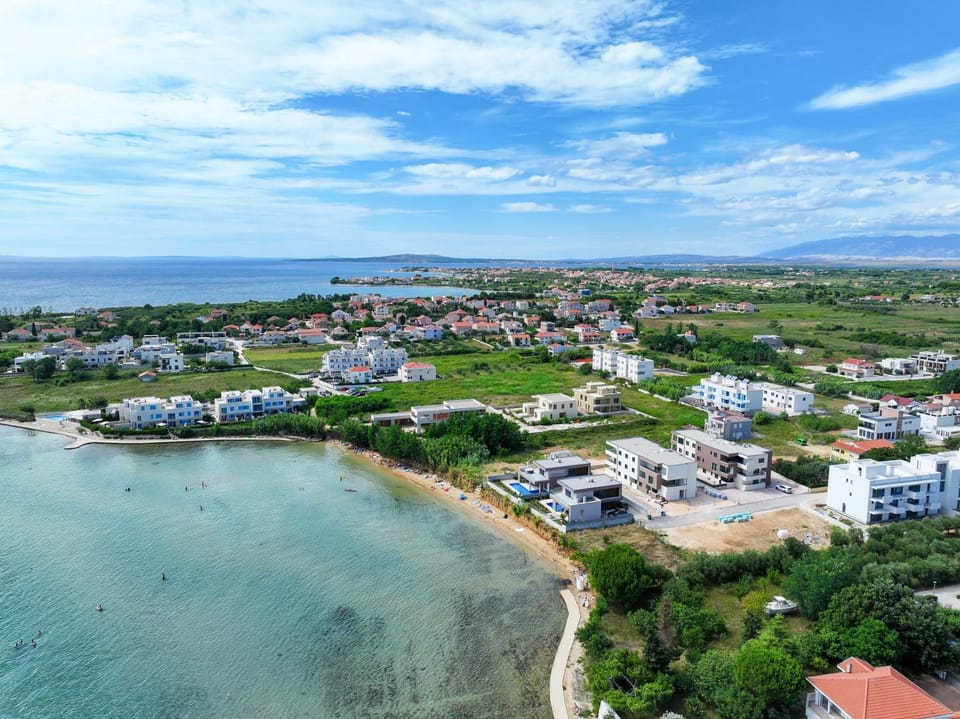 Property building, Day, Natural landscape, Bird's eye view, Beach, Sea view