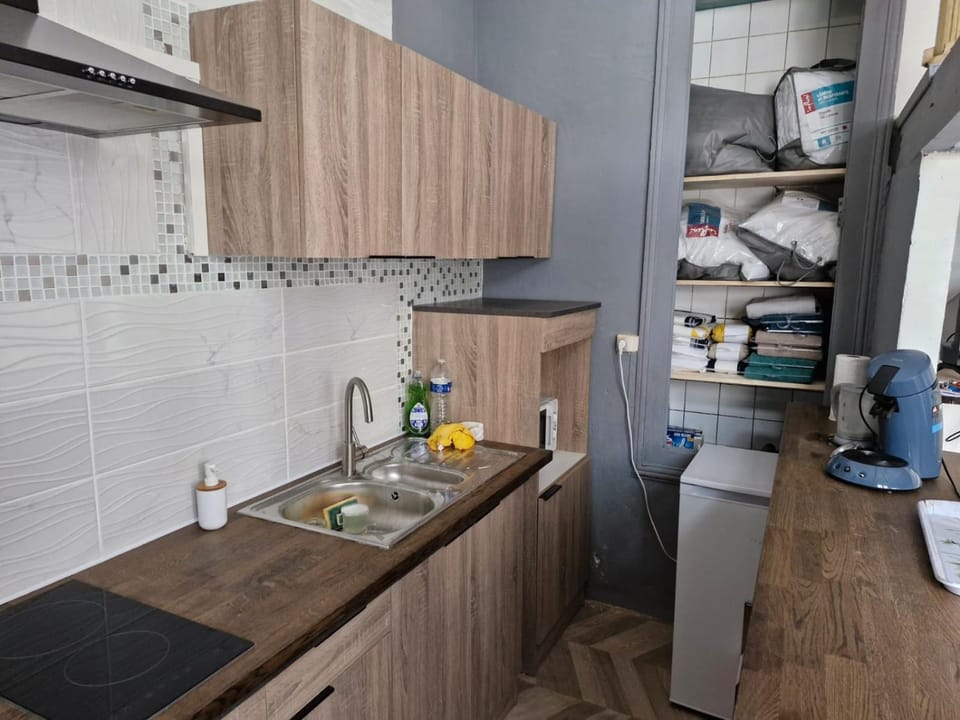 Kitchen or kitchenette, stove