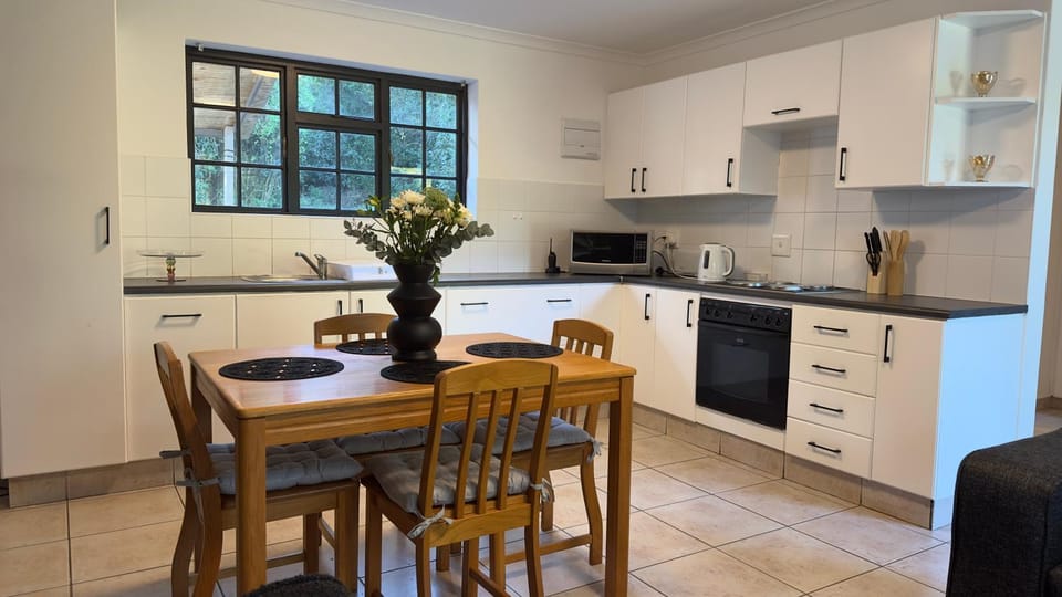 Kitchen or kitchenette, Dining area, oven, stove, toaster