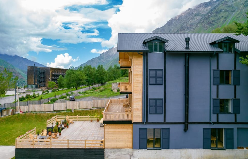 Property building, Nearby landmark, Spring, Day, Natural landscape, Mountain view