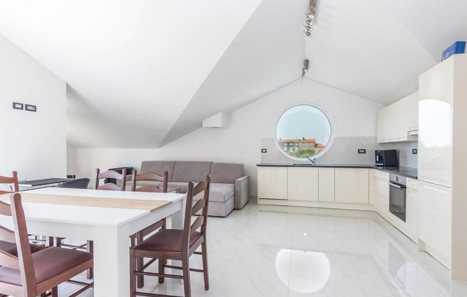 Kitchen or kitchenette, Seating area, Dining area, oven, stove, air conditioner