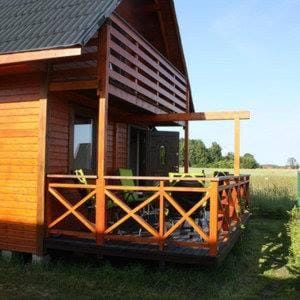 Domek piętrowy klimatyzowany, ogrzewany z jacuzzi na terenie ośrodka- Domki u Staszka Chalet in West Pomeranian Voivodeship, Poland