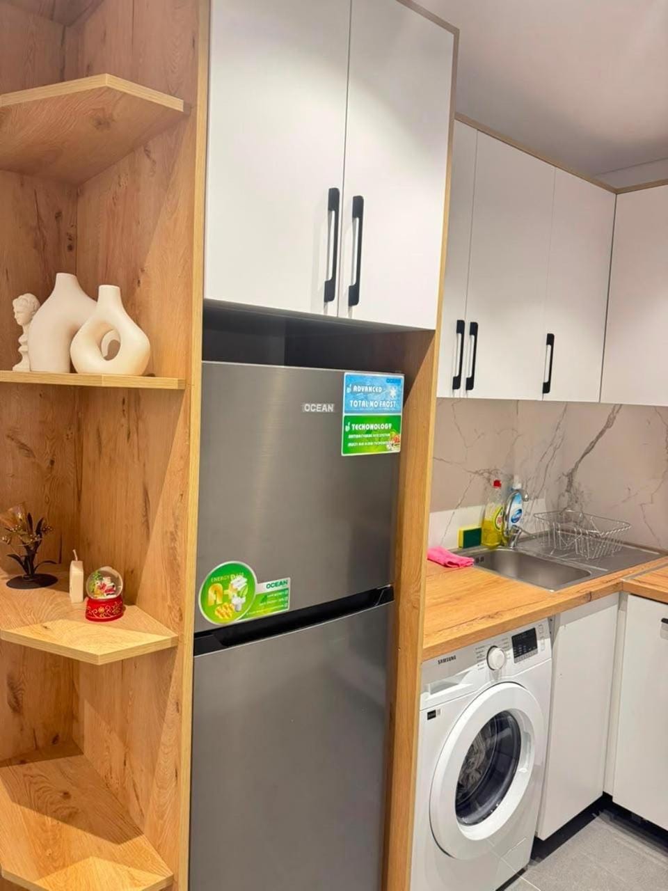 Kitchen or kitchenette, washing machine