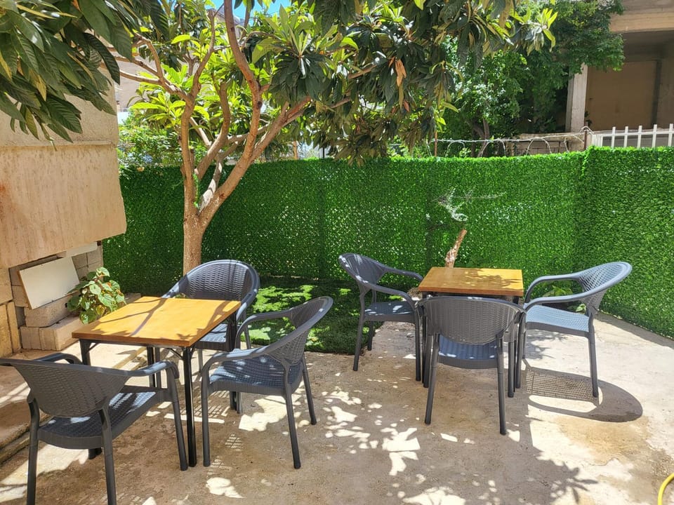 Property building, Patio, Spring, Day, Garden, View (from property/room), Balcony/Terrace, Seating area, Dining area, Garden view