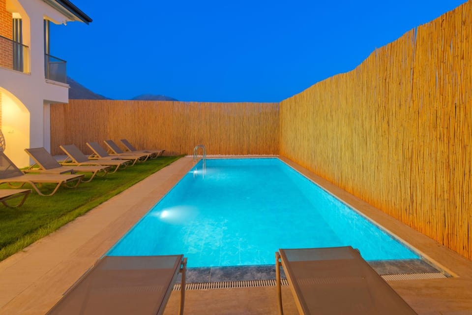 Night, Pool view, Swimming pool, sunbed