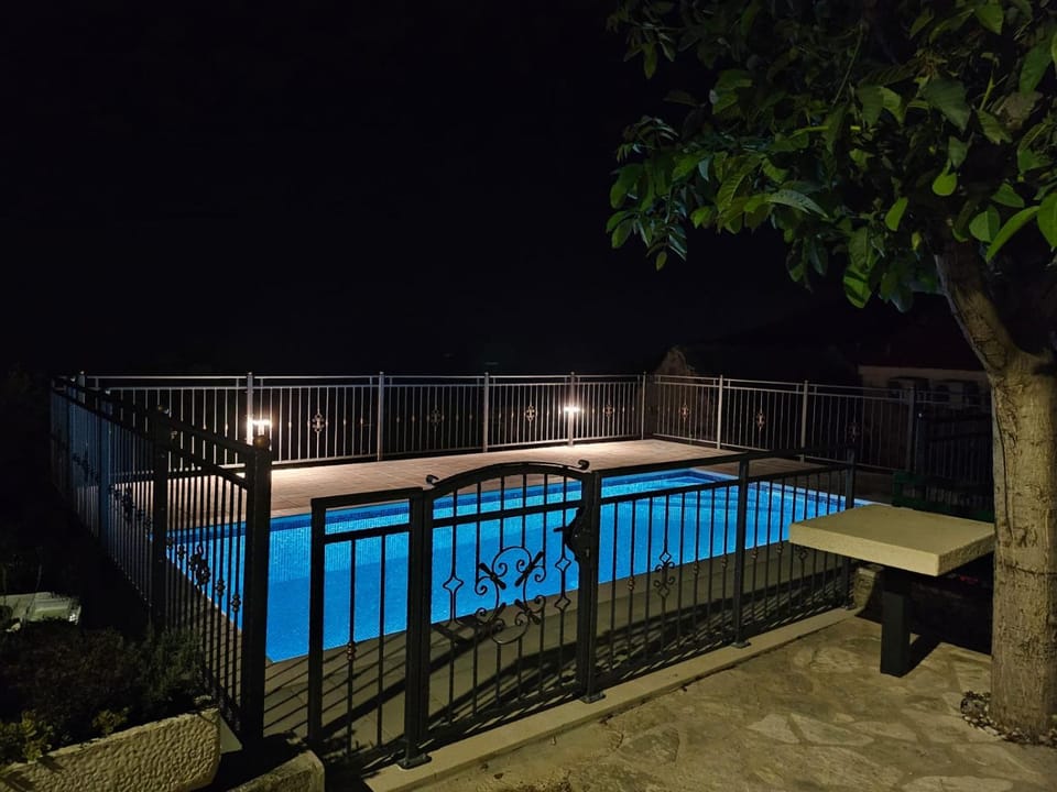 Night, View (from property/room), Balcony/Terrace, Pool view, Swimming pool