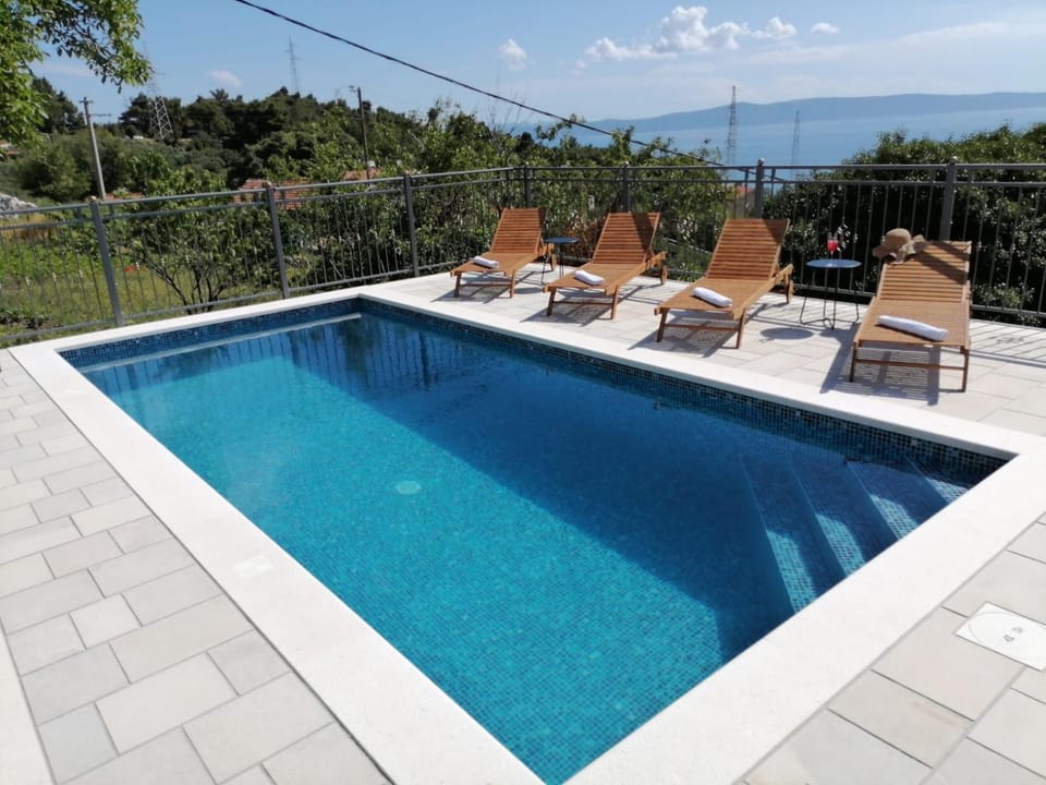 Patio, Day, Natural landscape, Pool view, Sea view, Swimming pool, sunbed
