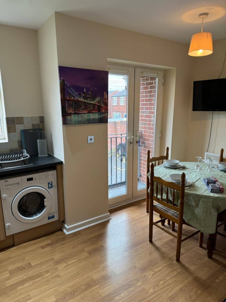 Kitchen or kitchenette, Seating area, Dining area, stove, washing machine