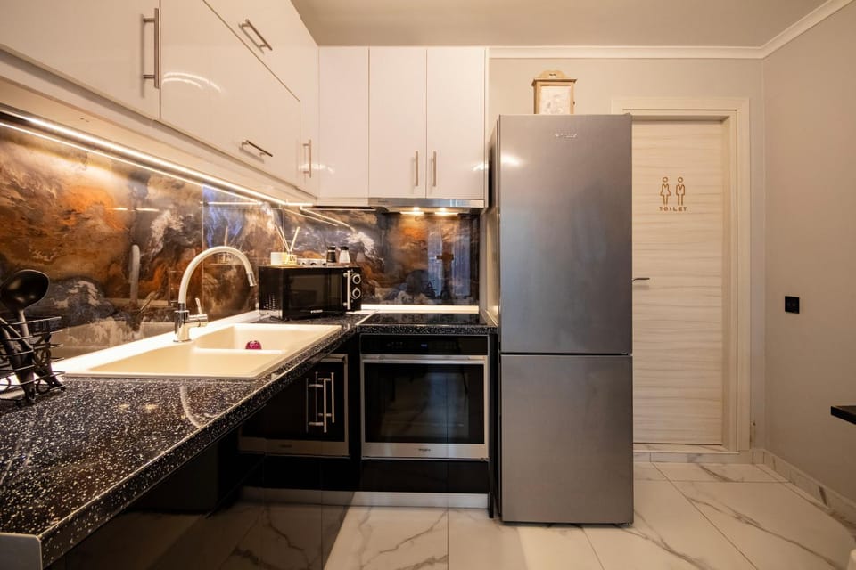 Kitchen or kitchenette, oven, stove