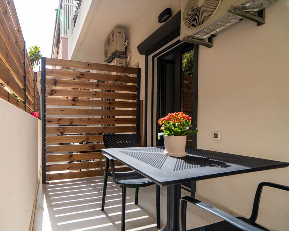 Patio, Day, Balcony/Terrace, Balcony/Terrace, Quiet street view