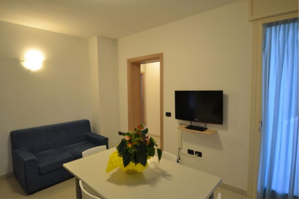 Bright apartment surrounded by greenery Apartment in Rosolina Mare