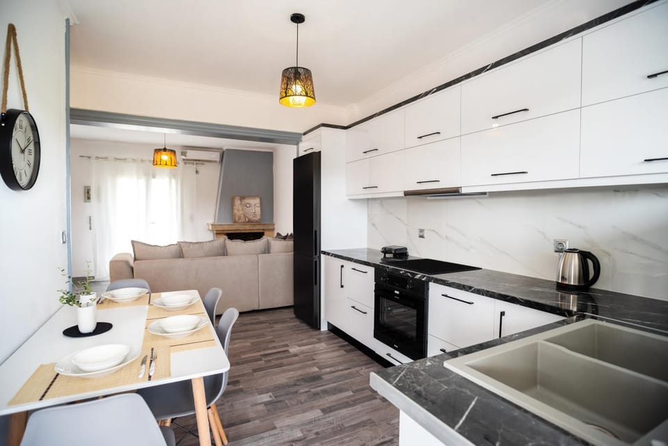Kitchen or kitchenette, dishwasher, oven, stove