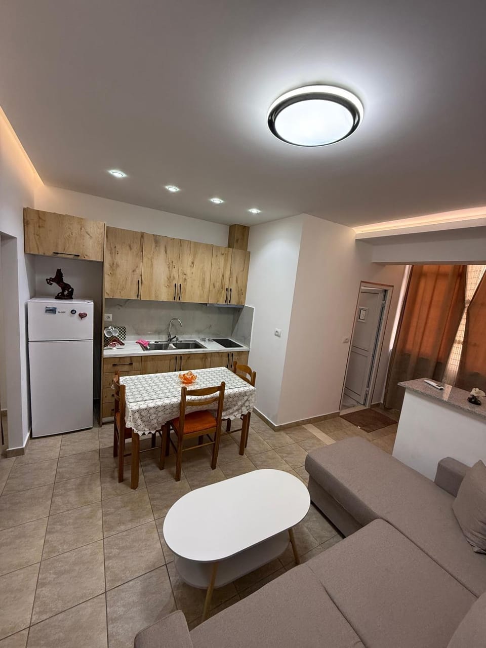 Kitchen or kitchenette, Living room, Seating area, Dining area