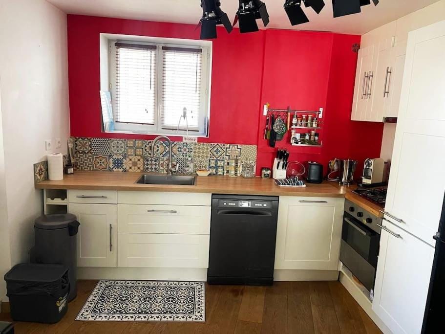 Kitchen or kitchenette, dishwasher, oven, stove, toaster