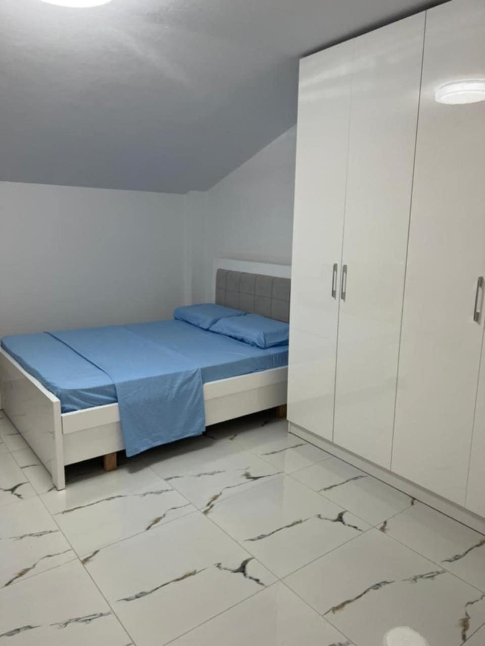 Bed, wardrobe