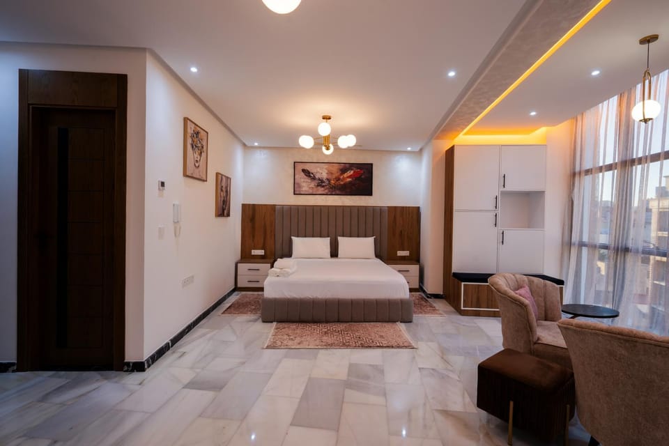 Bed, Living room, Photo of the whole room, Seating area, Bedroom
