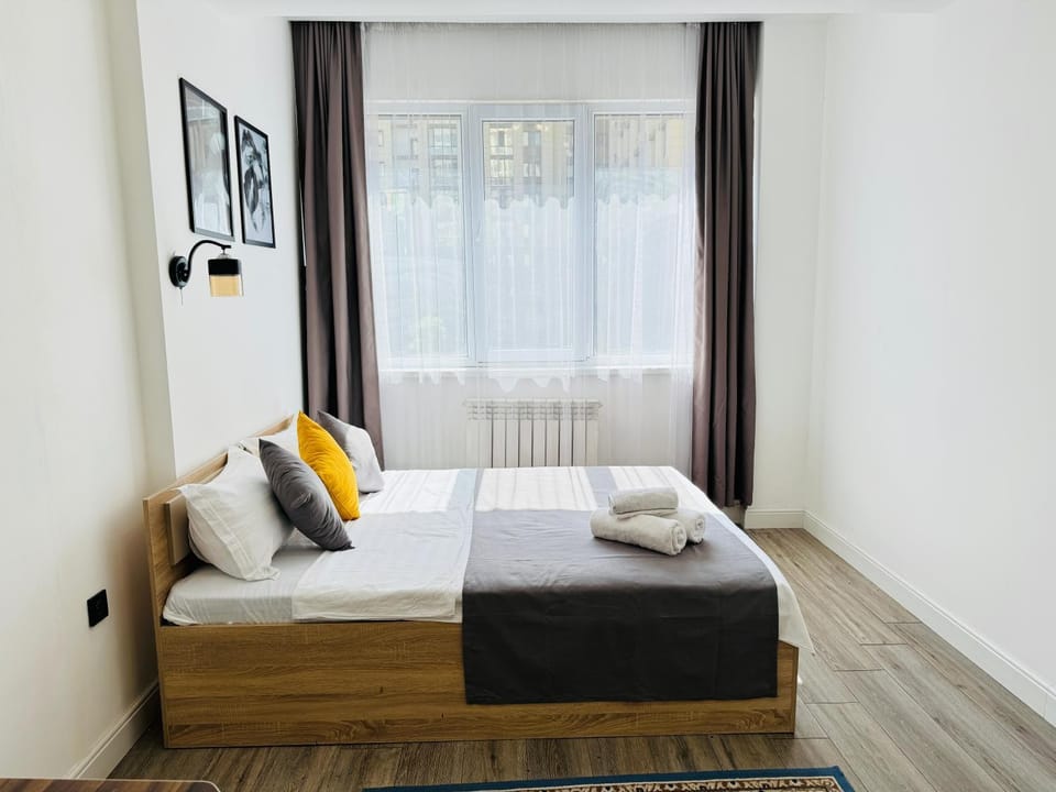 417I1 Gray and Yellow apartment Sholpan city Apartment in Almaty