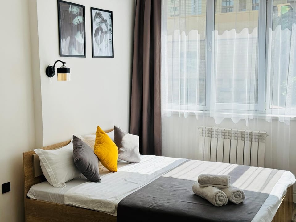 417I1 Gray and Yellow apartment Sholpan city Apartment in Almaty