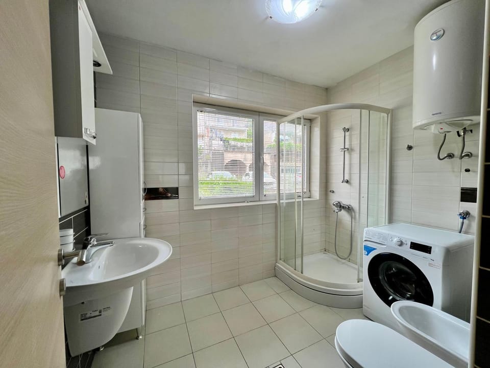 Shower, Toilet, Bathroom, Bath, bidet, towels, washing machine