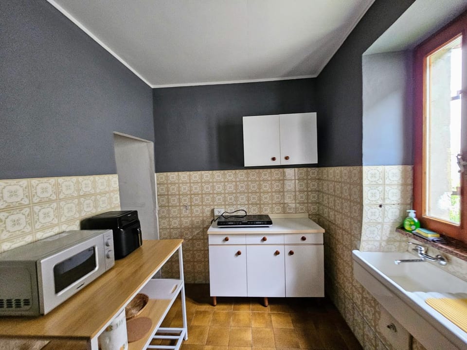 Kitchen or kitchenette, stove