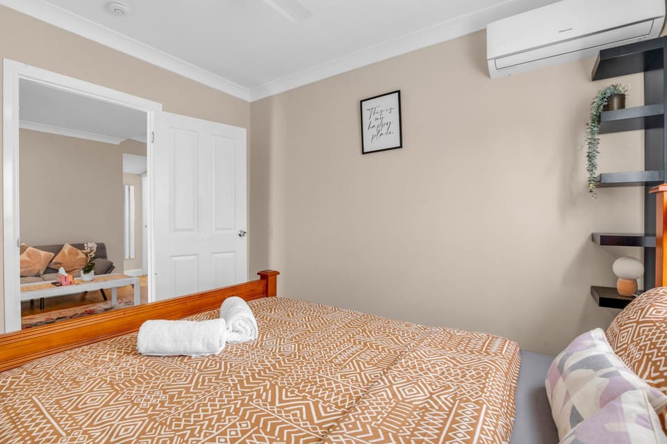 Bed, Photo of the whole room, Bedroom, towels, air conditioner