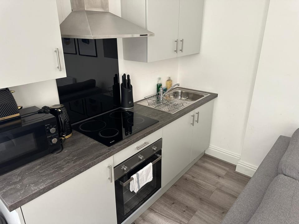 Kitchen or kitchenette, oven, stove