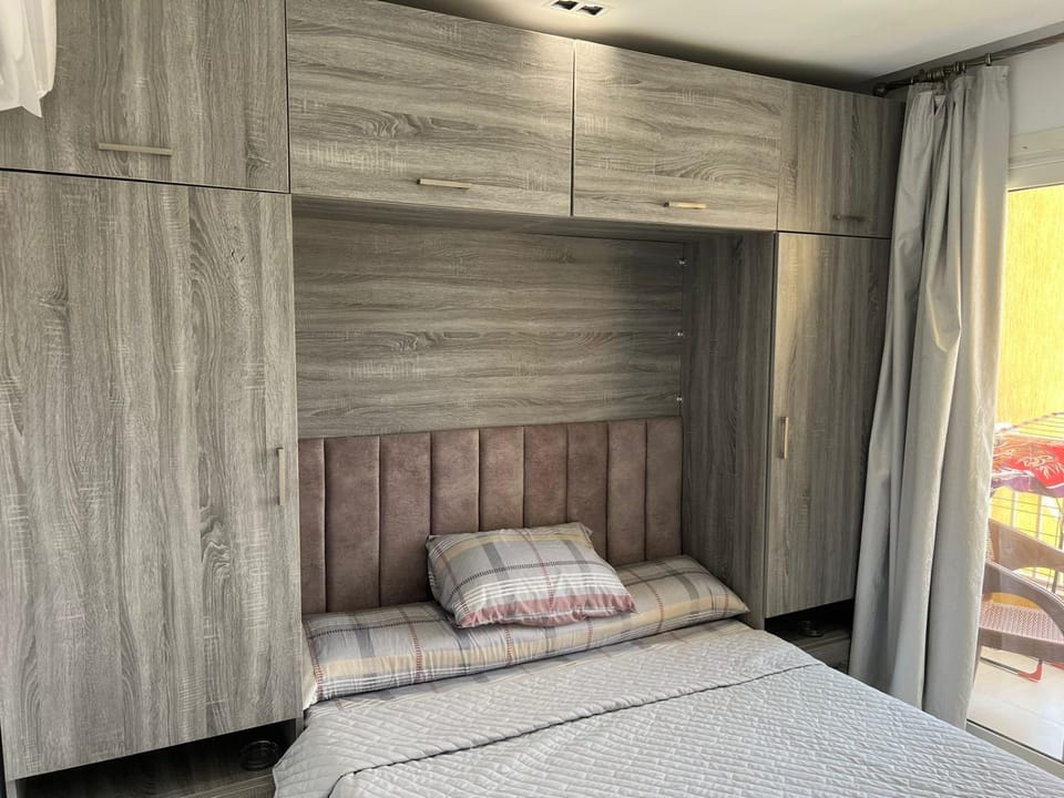 Bed, wardrobe