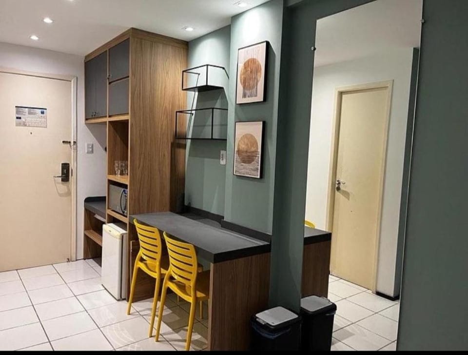 Dining area, minibar, oven, wardrobe